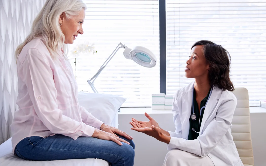 women talking to a female doctor