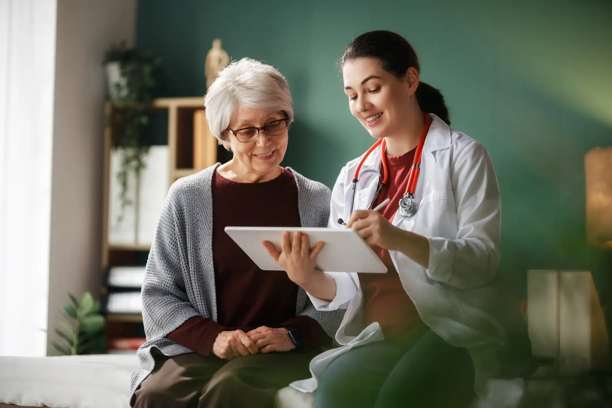 women talking with doctor